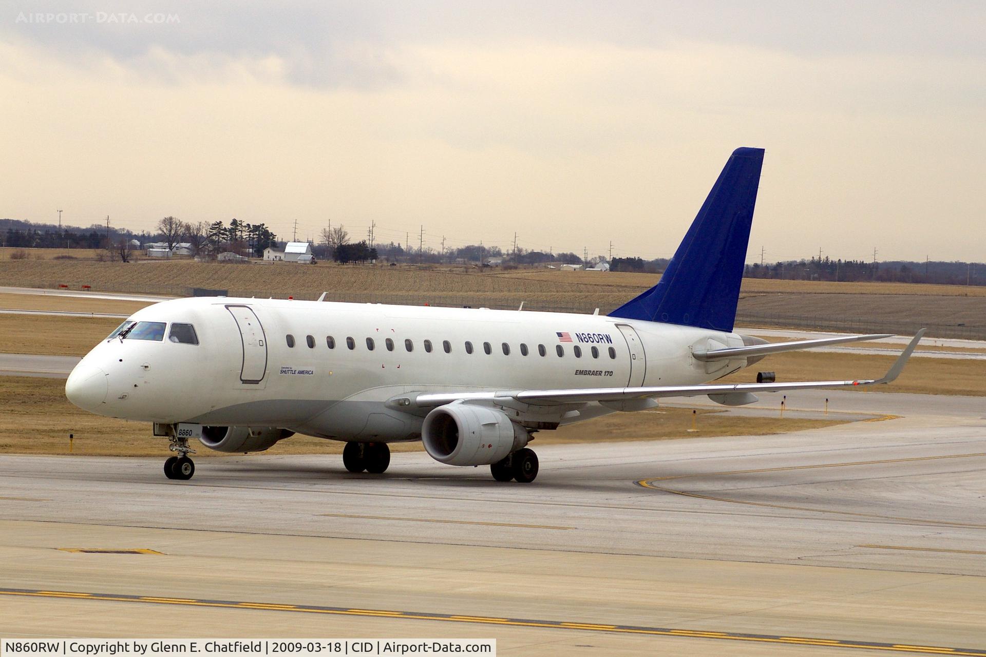 N860RW, 2005 Embraer 170SE (ERJ-170-100SE) C/N 17000084, Taxiing inbound to the terminal , seen from the tower's 2nd floor