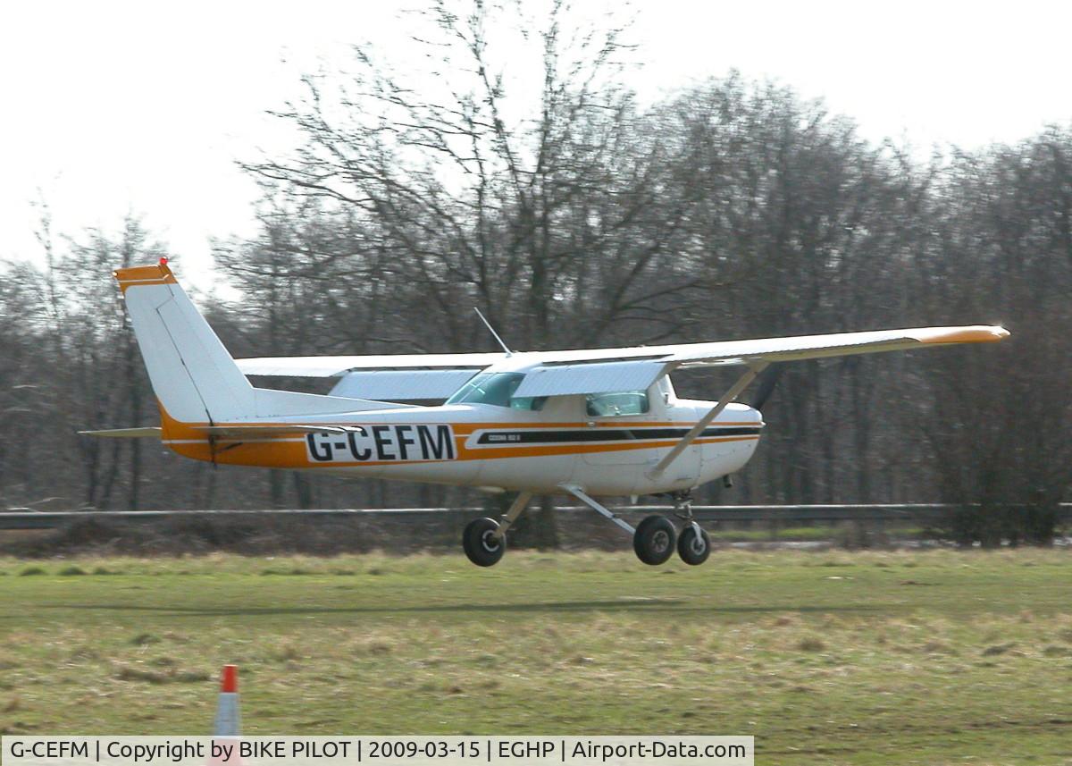 G-CEFM, 1980 Cessna 152 C/N 152-84357, ABOUT TO TOUCH DOWN ON RWY 26