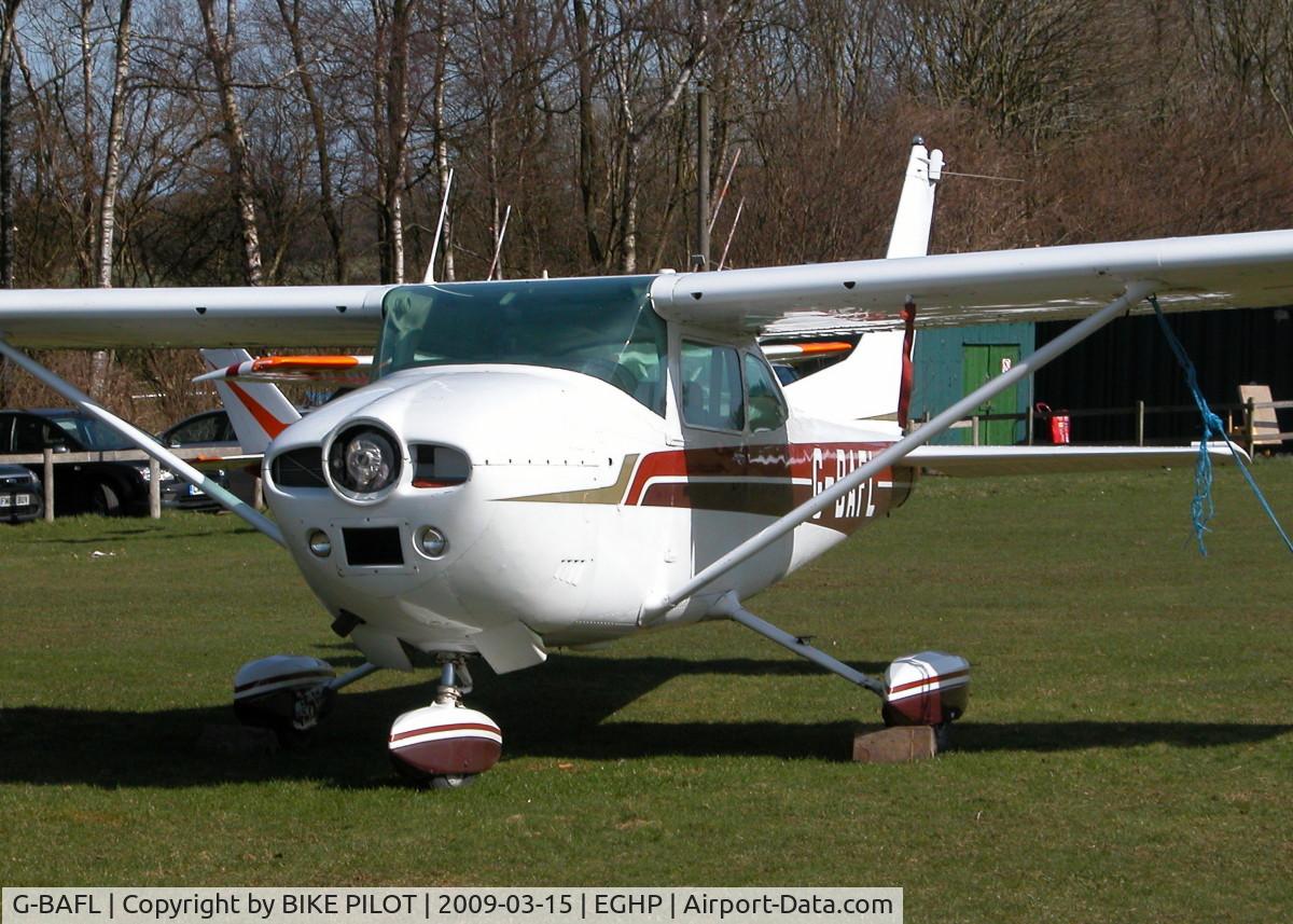 G-BAFL, 1973 Cessna 182P Skylane C/N 182-61469, SITTING OUTSIDE THE WILTSHIRE AVIATION HANGER
