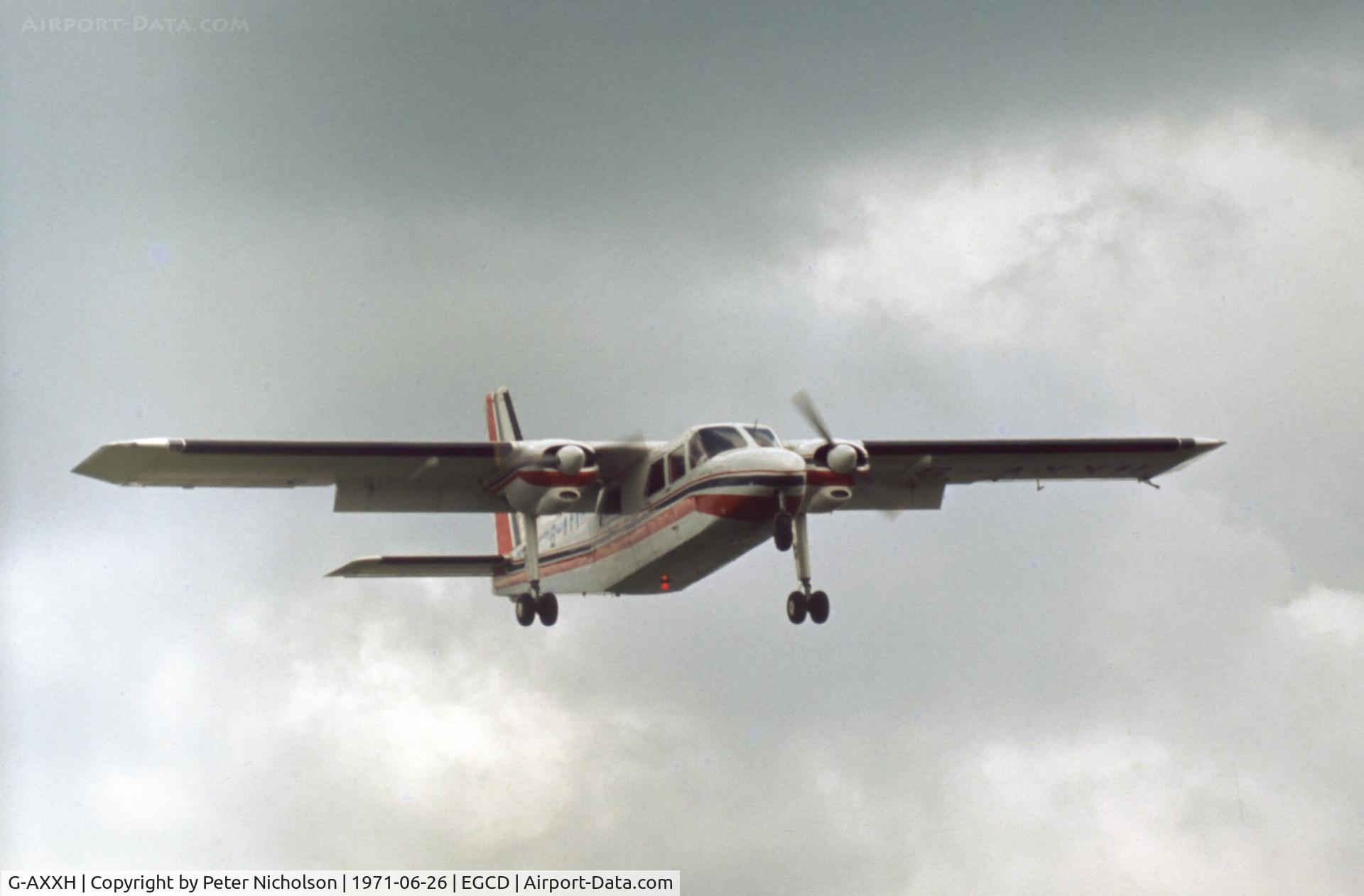 G-AXXH, 1970 Britten-Norman BN-2A-27 Islander C/N 144, Islander climbing out with parachute display team aboard at the 1971 Woodford Airshow.