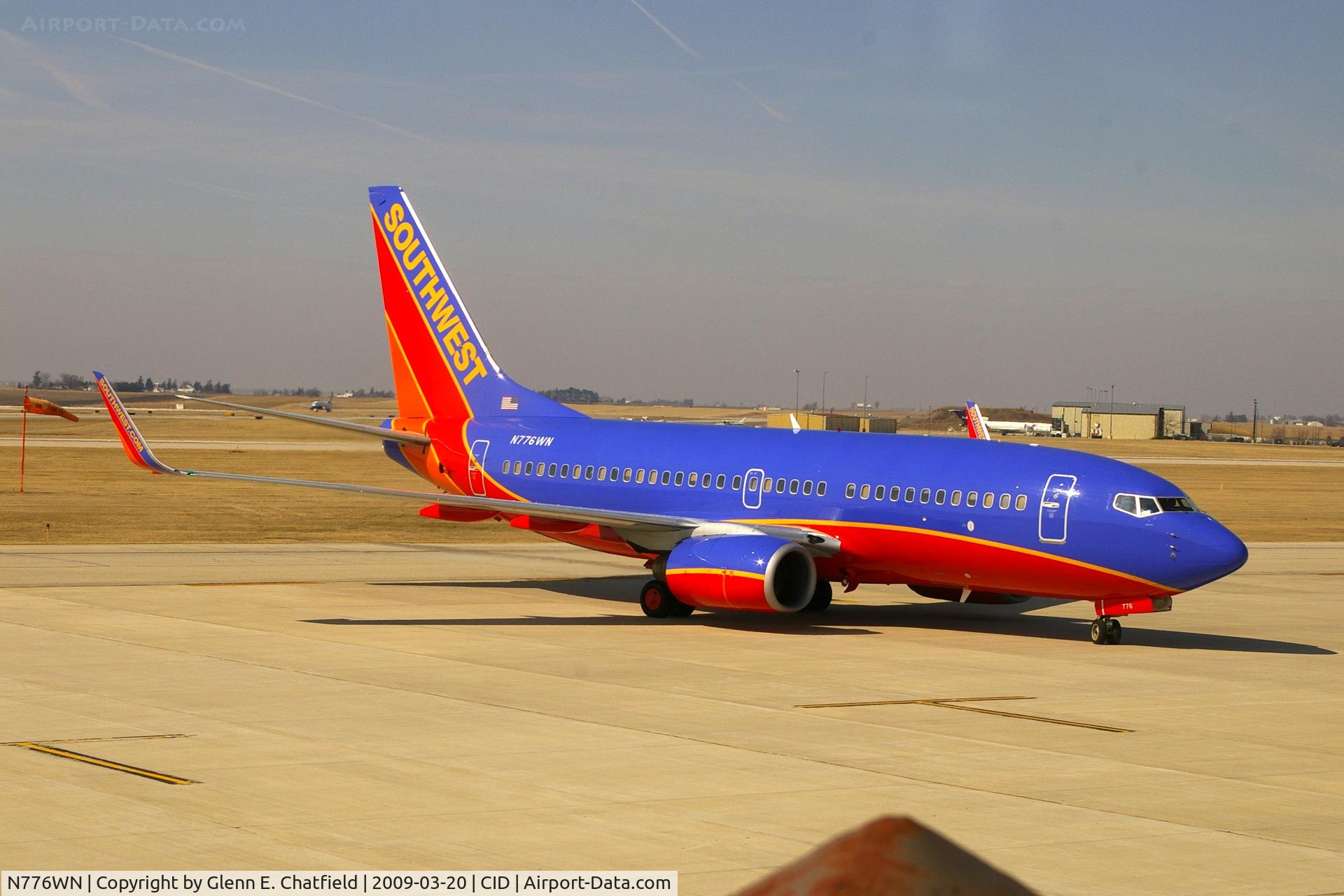N776WN, 2000 Boeing 737-7H4 C/N 30591, Pulling into Landmark FBO from taxiway D, as seen from my office