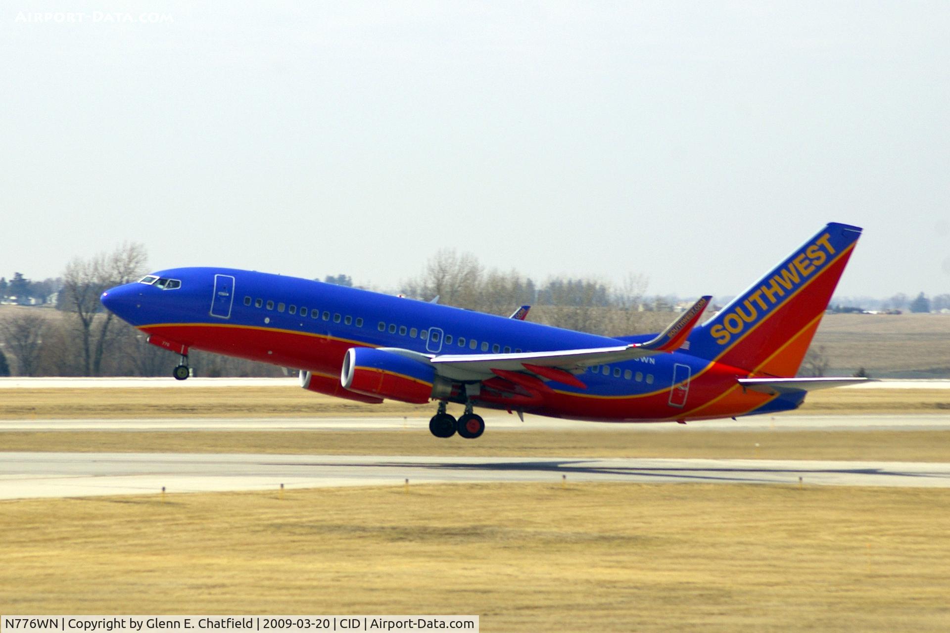 N776WN, 2000 Boeing 737-7H4 C/N 30591, Departing Runway 13 at high noon.  Airborne in less than 2000 feet