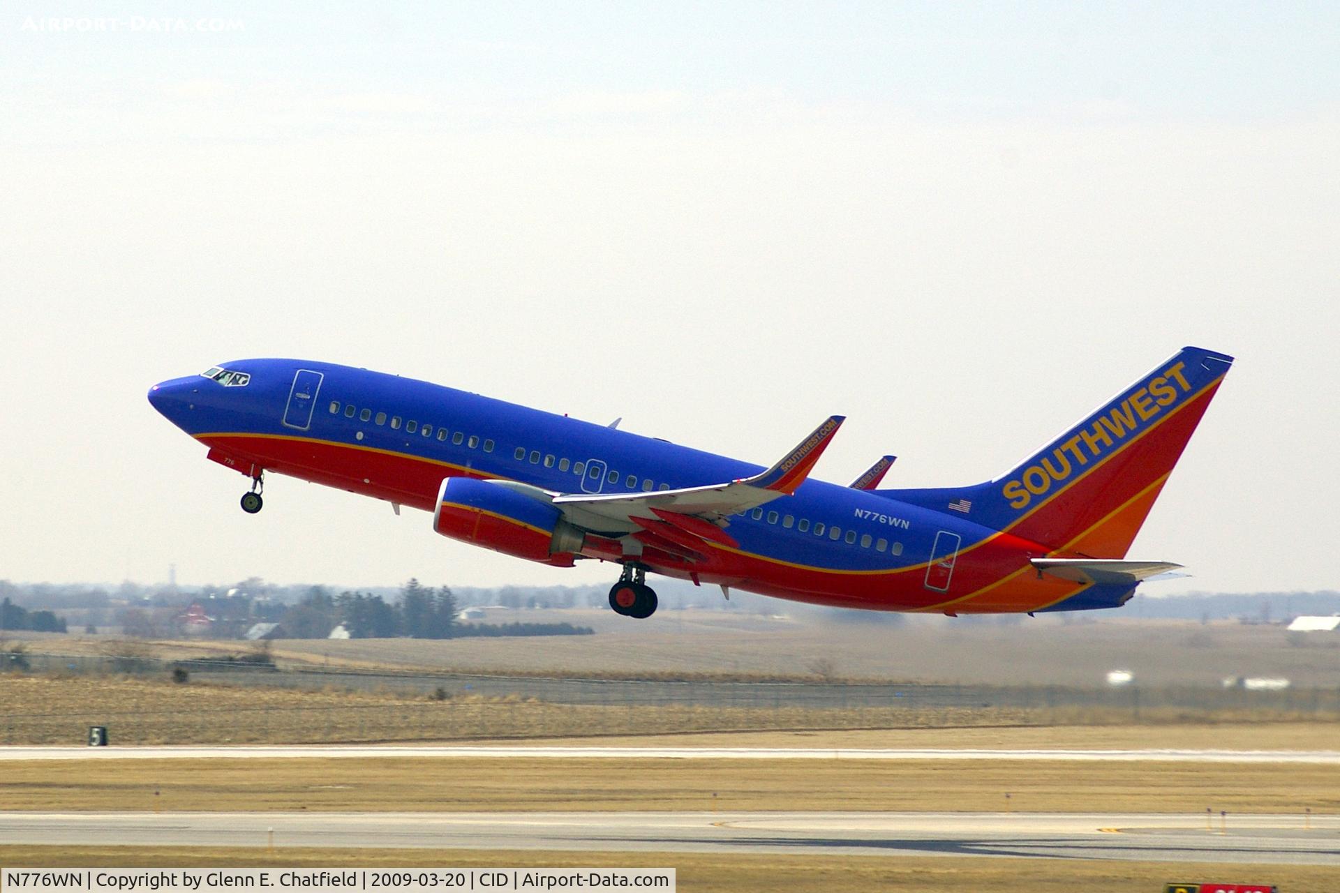 N776WN, 2000 Boeing 737-7H4 C/N 30591, Departing Runway 13 at high noon.