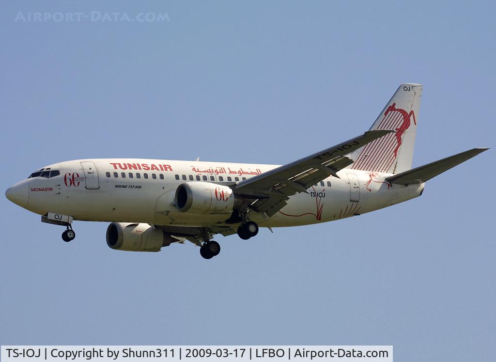 TS-IOJ, 1995 Boeing 737-5H3 C/N 27912, Landing rwy 32L with 60th anniversary stickers...