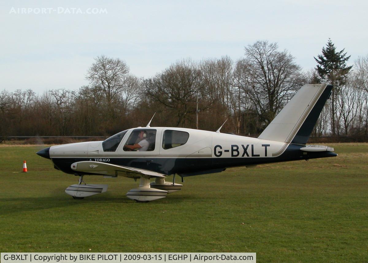 G-BXLT, 1992 Socata TB-200 Tobago XL C/N 1457, TAXYING PAST THE CLUB HOUSE