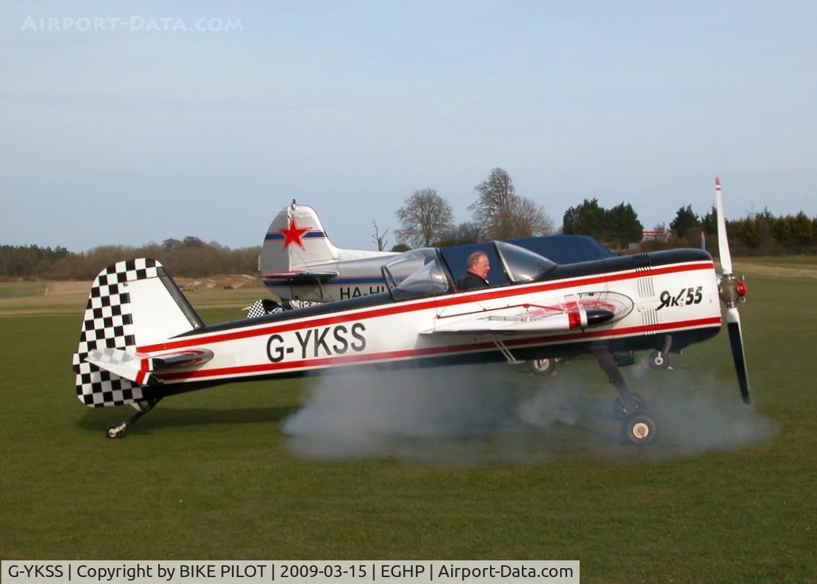 G-YKSS, 1990 Yakovlev Yak-55 C/N 901103, TYPICAL SMOKEY START UP