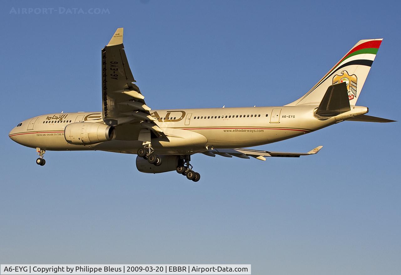 A6-EYG, 2006 Airbus A330-243 C/N 724, Short final 02 by a glorious sunny winter afternoon. Tuined all golden from the setting sun.