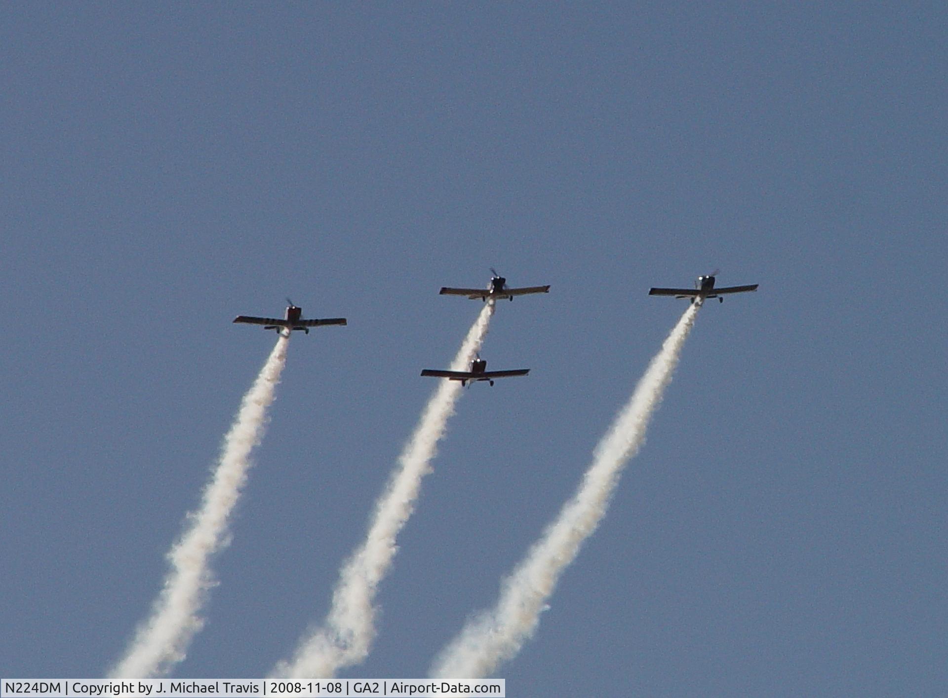 N224DM, Vans RV-4 C/N 001 (N224DM), N224DM formation pass (lead, top center) at GA2.