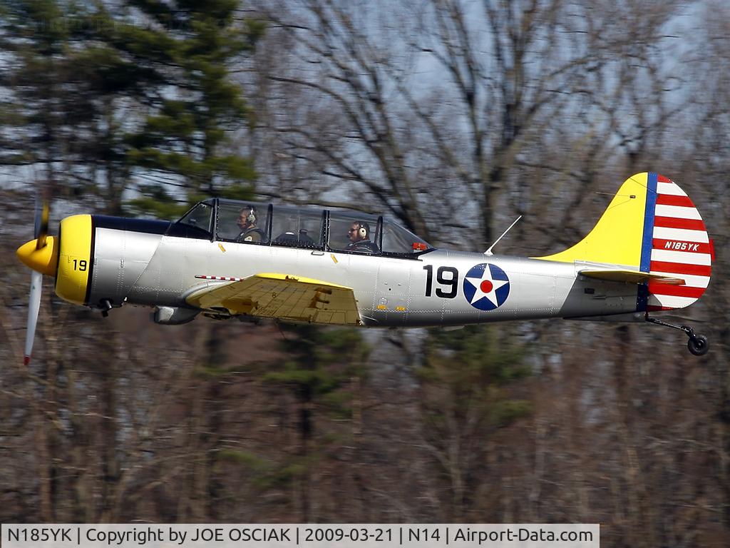 N185YK, 2003 Yakovlev (Aerostar) Yak-52TW C/N 0312406, Leaving the Flying W