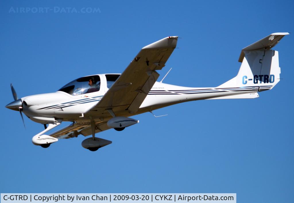 C-GTRD, 2005 Diamond DA-40 Diamond Star C/N 40.539, Landing at Toronto Buttonville Airport