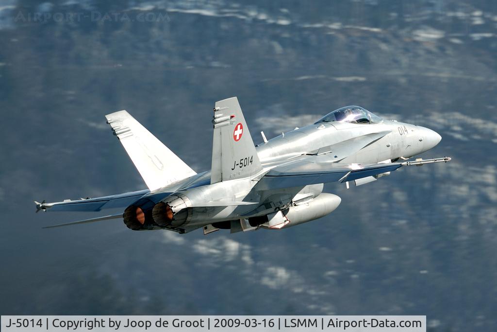 J-5014, McDonnell Douglas F/A-18C Hornet C/N 1359, After take off the aircraft roar over the town of Meiringen. The protests against the noice are growing