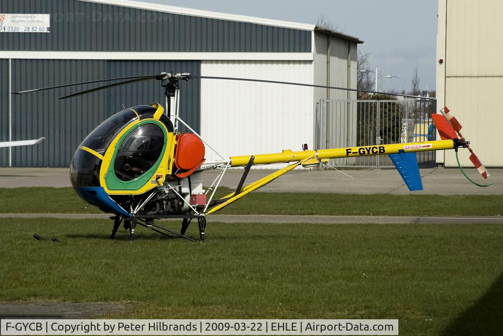 F-GYCB, Schweizer 269C C/N S-1740, Between two hangars I saw this nice Schwizer at lelyestad Airport
