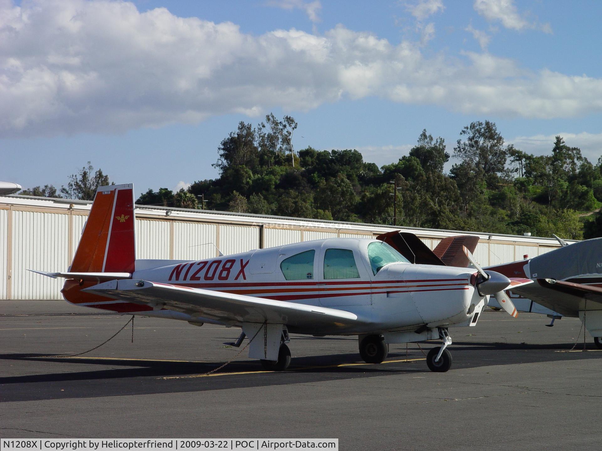 N1208X, 1963 Mooney M20C Ranger C/N 2611, Parked and tied down at Brackett