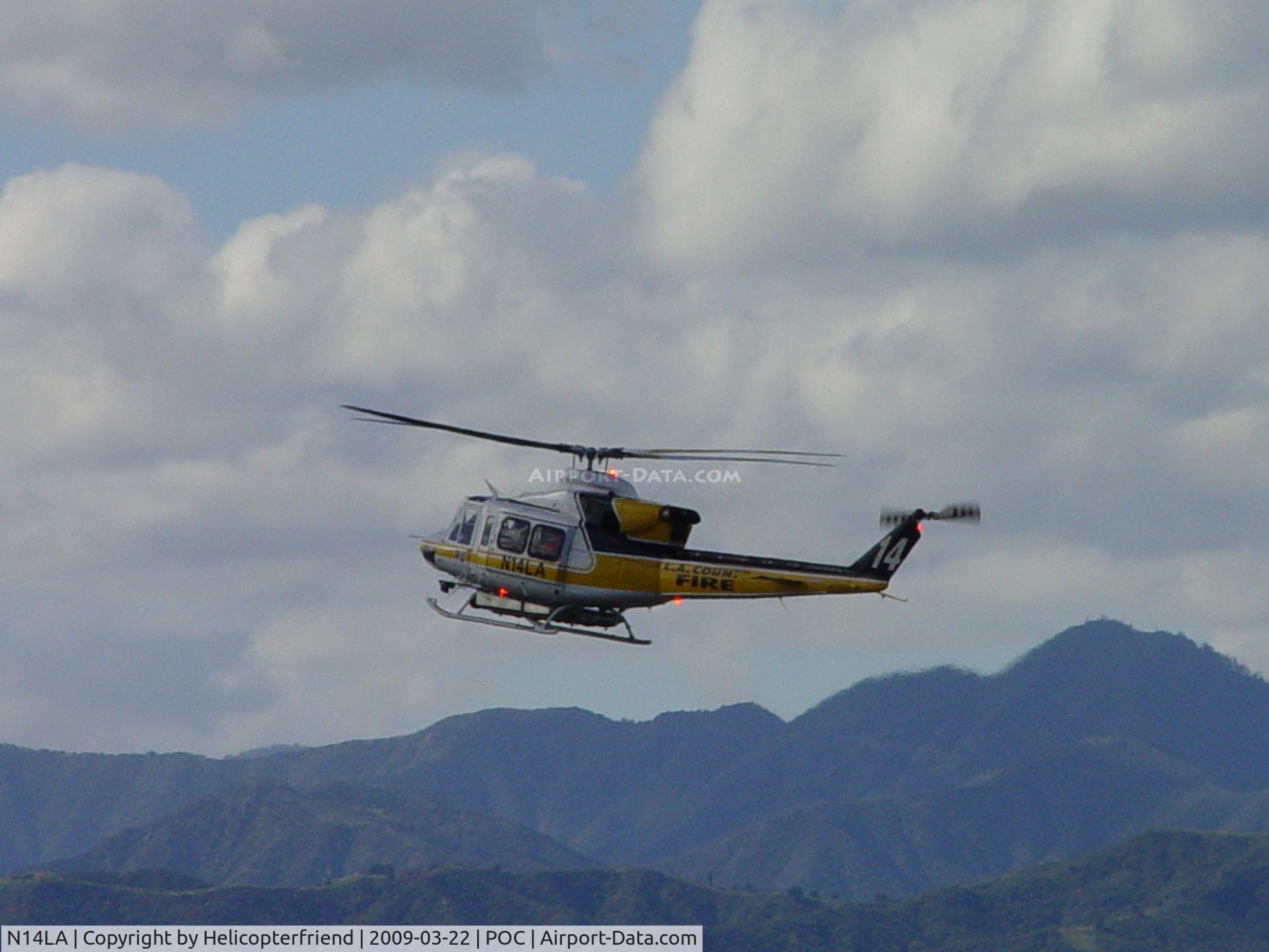 N14LA, 2005 Bell 412EP C/N 36393, Stopping, hovering, preparing to turn left (south) into EHA helipad