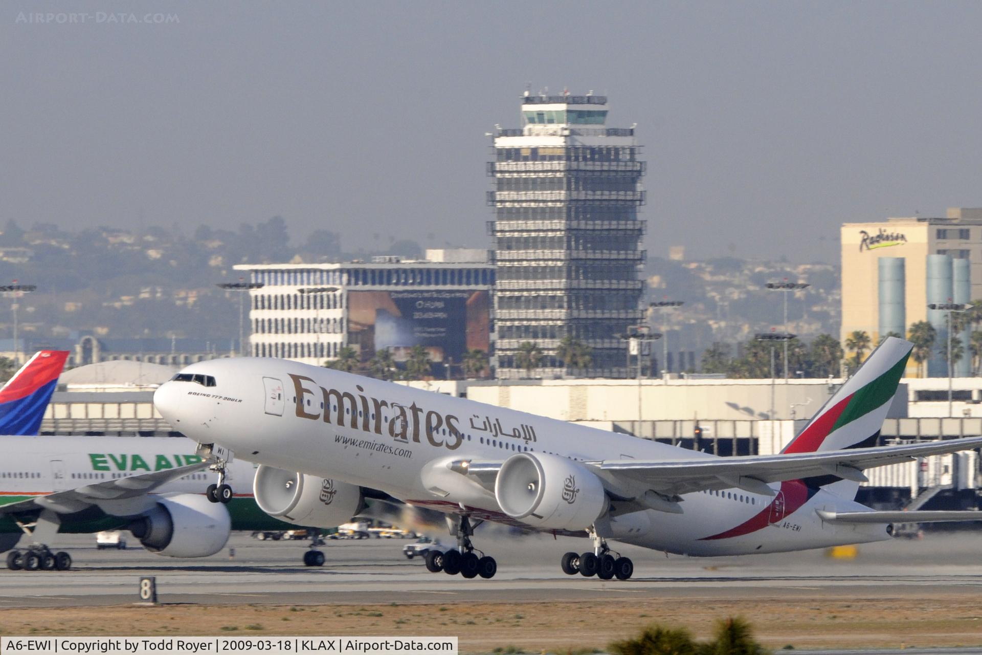 A6-EWI, 2008 Boeing 777-21H/LR C/N 35589, Departing LAX on 25R