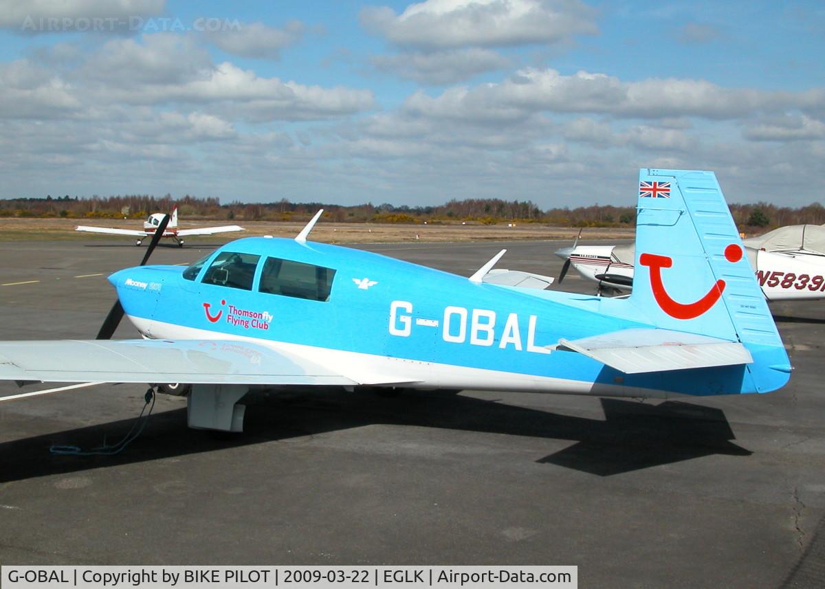 G-OBAL, 1986 Mooney M20J 201 C/N 24-1601, COLORFUL MOONEY PARKED ON THE TERMINAL APRON