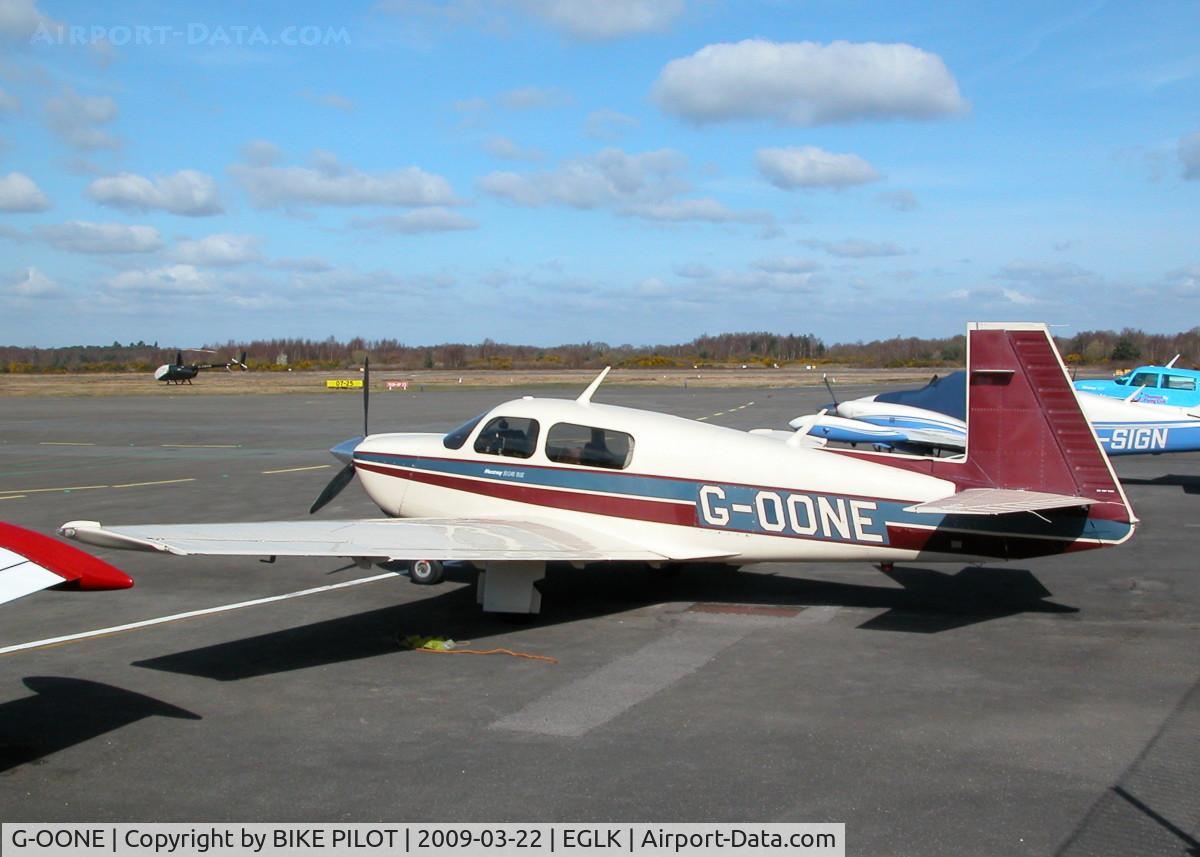 G-OONE, 1987 Mooney M20J 201 C/N 24-3039, PARKED ON THE TERMINAL APRON LOOKING GOOD IN THE SUN