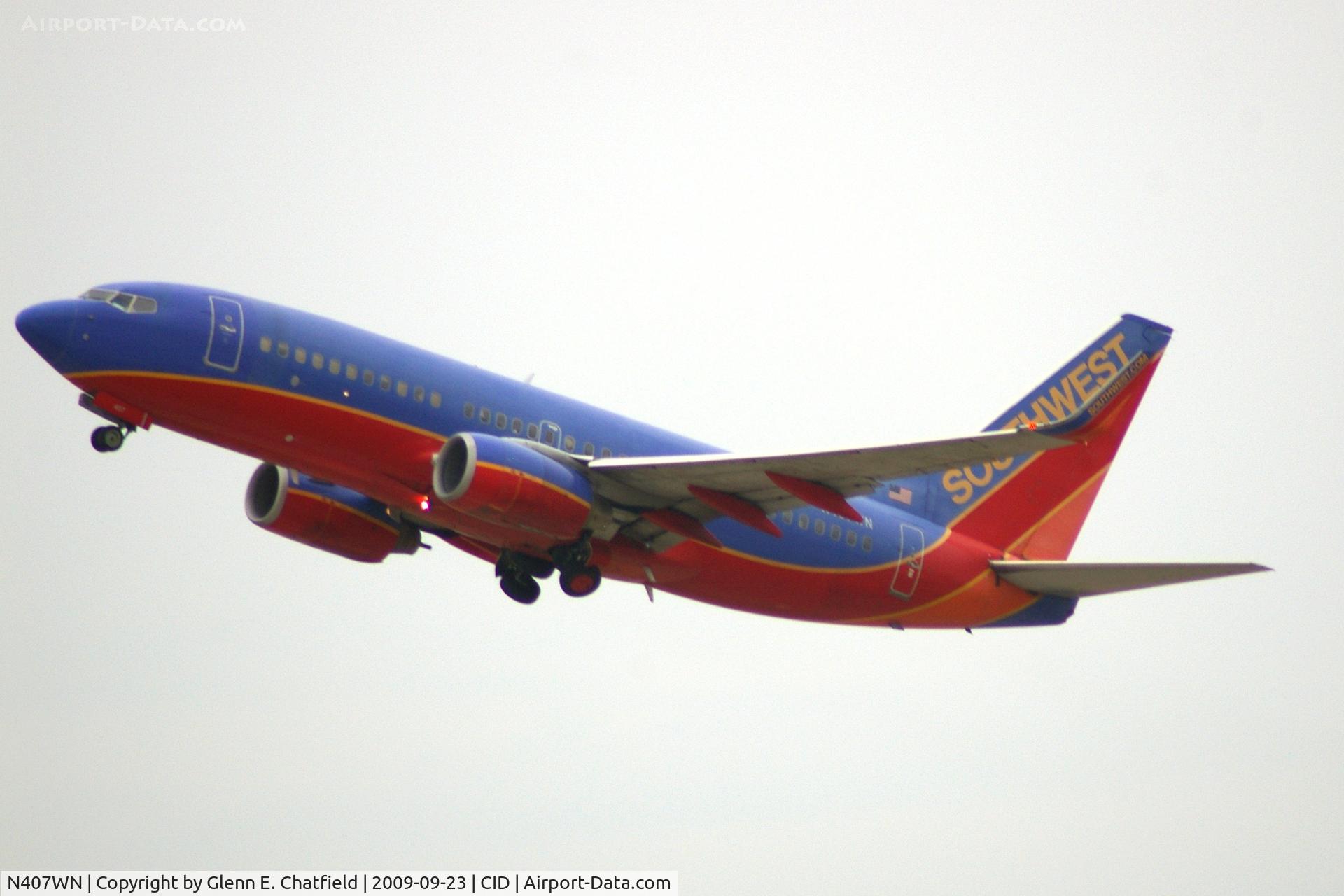 N407WN, 2001 Boeing 737-7H4 C/N 29817, Climbing out after departing runway 9.