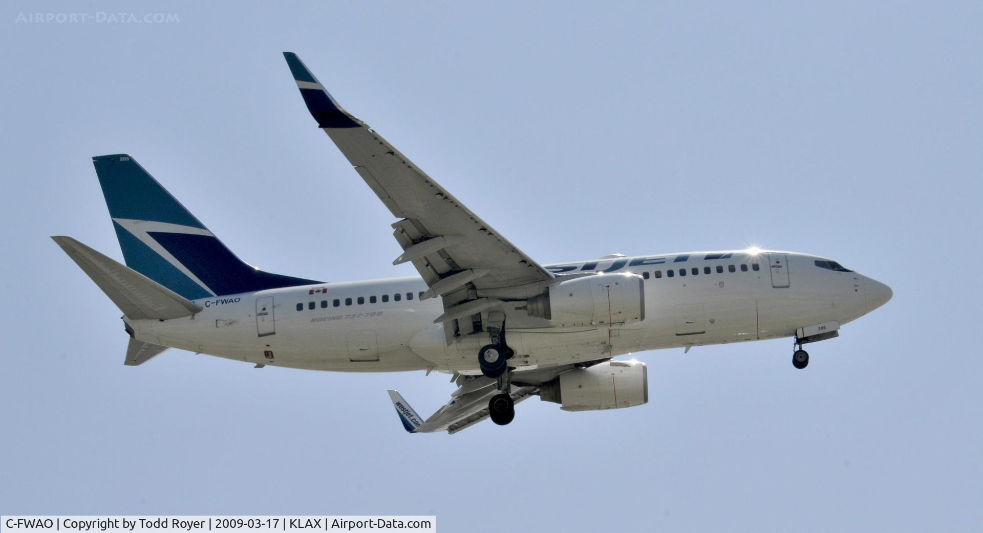 C-FWAO, 2002 Boeing 737-7CT C/N 33657, Landing 24R at LAX