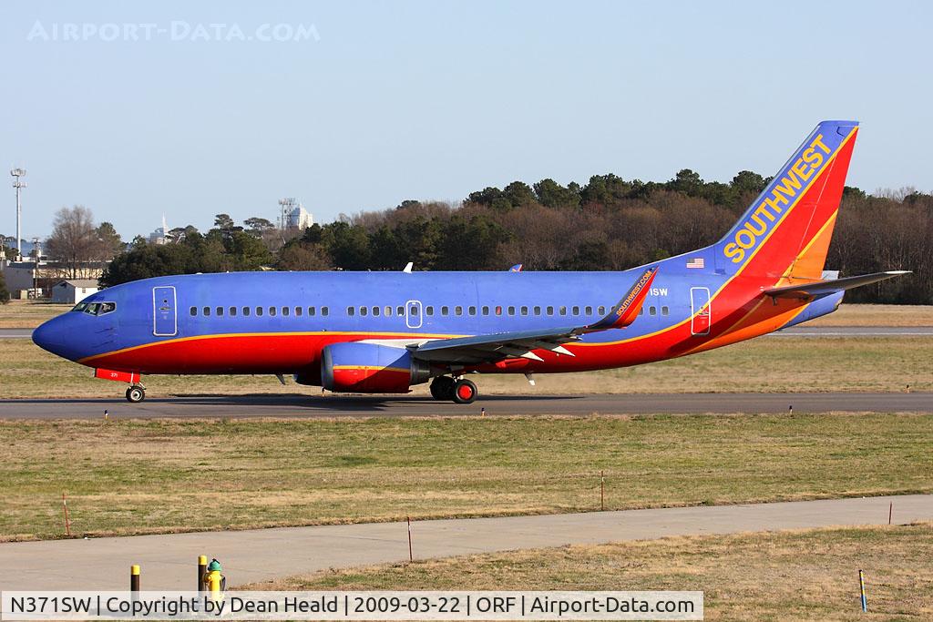 N371SW, 1993 Boeing 737-3H4 C/N 26598, Southwest Airlines N371SW (FLT SWA595) taxiing to RWY 23 for departure to Orlando Int'l (KMCO).