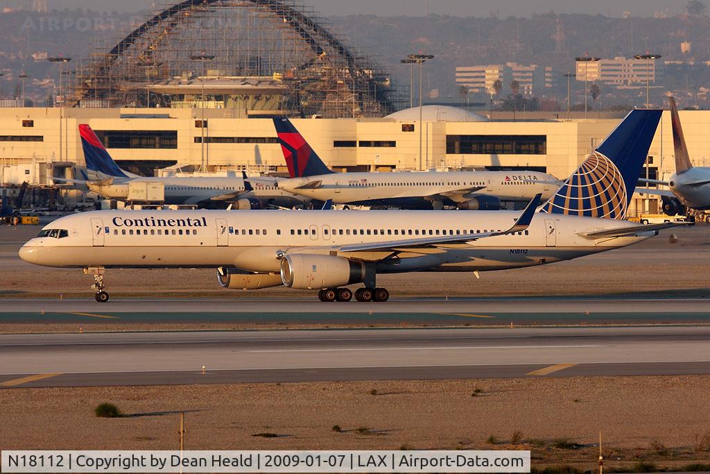 N18112, 1995 Boeing 757-224 C/N 27302, Continental Airlines N18112 (FLT COA17) holding short of RWY 25R after arrival on RWY 25L from Newark Liberty Int'l (KEWR).