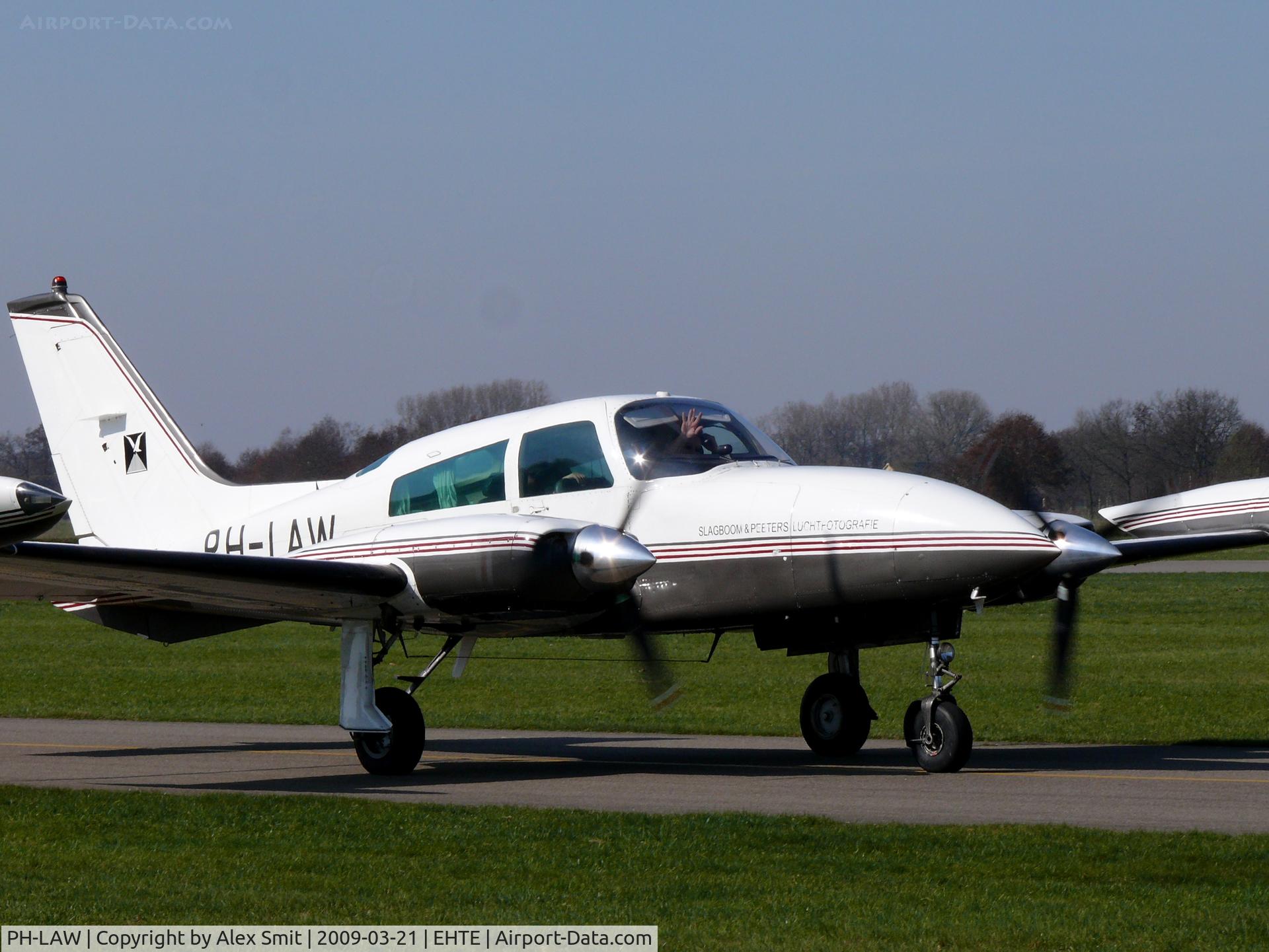 PH-LAW, Cessna T310R C/N 310R0096, Cessna T310R PH-LAW Slagboom & Peeters Luchtfotografie check out the pilot friendly waving!!!