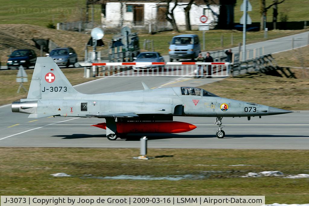 J-3073, Northrop F-5F Tiger II C/N L.1073, The Swiss runway crossings are unique: the traffic waits at the barrier until all aircraft have landed.