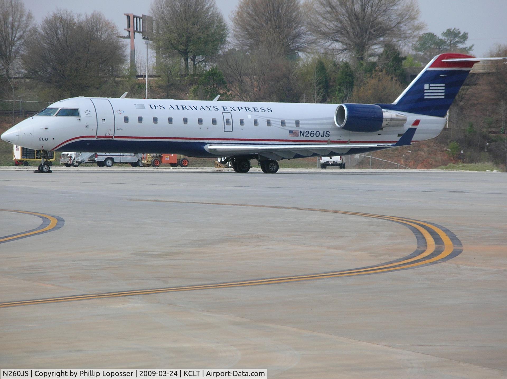N260JS, 2004 Bombardier CRJ-200ER (CL-600-2B19) C/N 7957, Resting at CLT