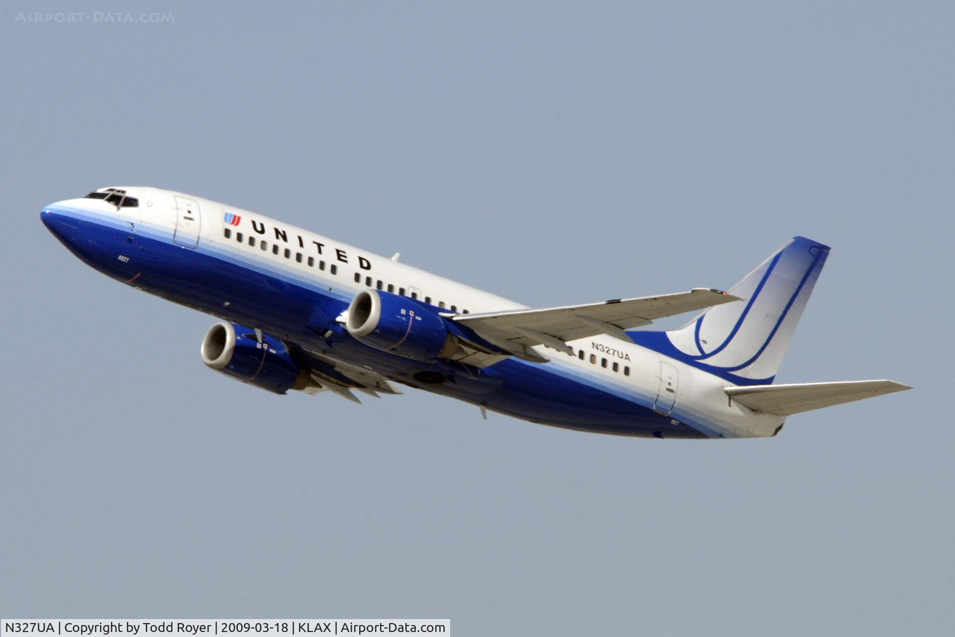 N327UA, 1988 Boeing 737-322 C/N 24147, Departing LAX on 25R