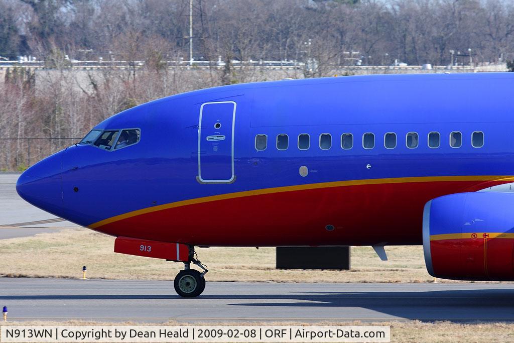 N913WN, 2008 Boeing 737-7H4 C/N 29840, Close-up nose shot of Southwest Airlines N913WN (FLT SWA1065) taxiing to RWY 23 for departure to Baltimore/Washington Int'l (KBWI).
