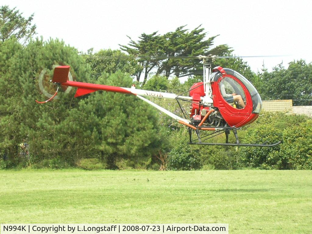 N994K, 1966 Hughes 269A C/N 67-16733, Departing st.Agnes school, Cornwall July 08. Pilot G.Perry