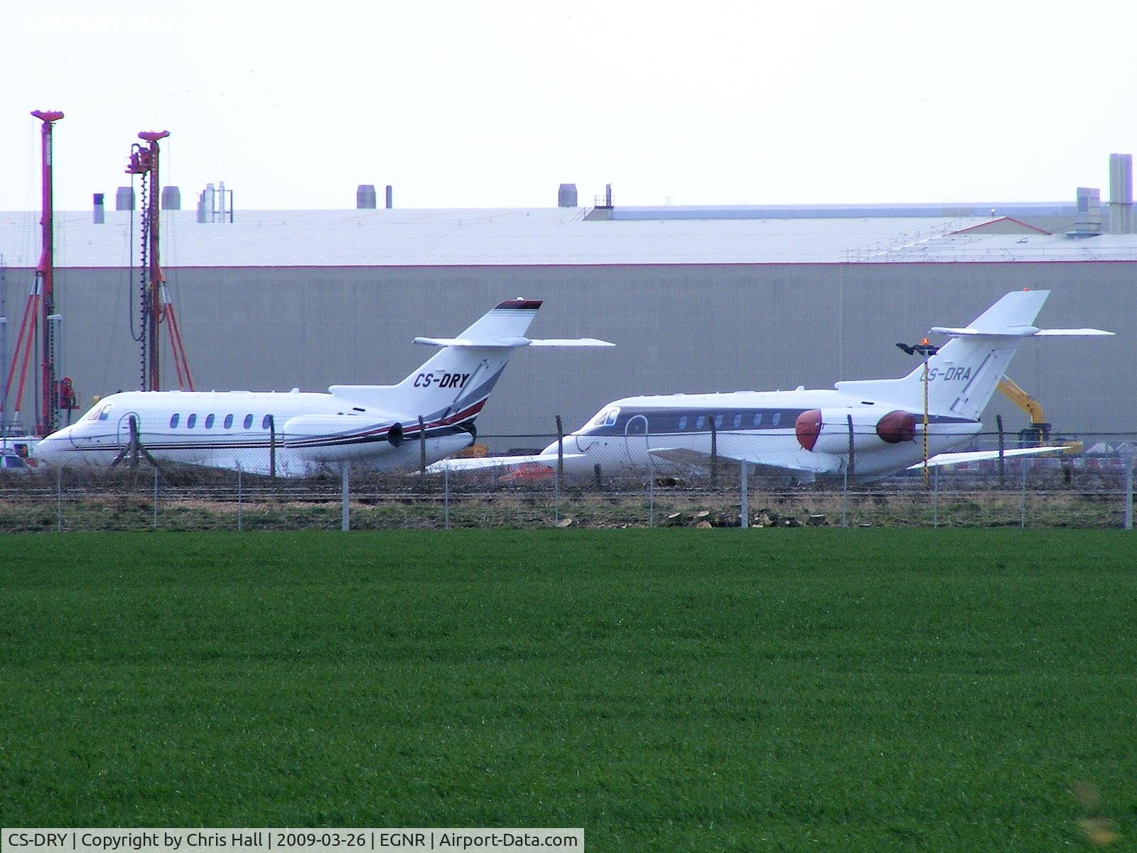 CS-DRY, 2007 Raytheon Hawker 800XP C/N 258840, in the old Netjets colours alongside CS-DRA in the new colours
