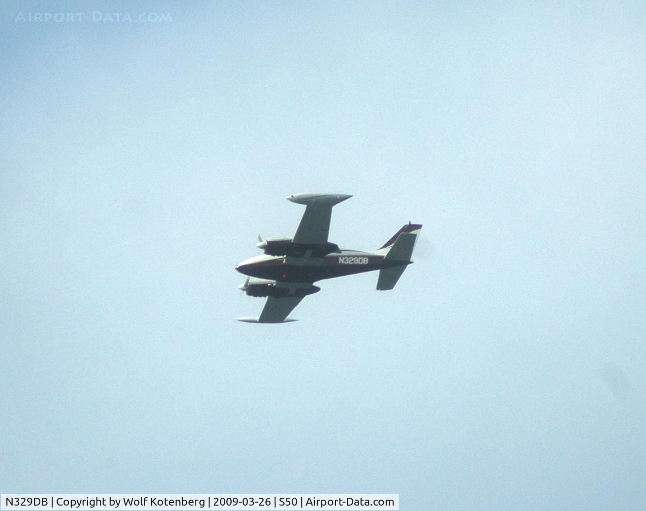 N329DB, 1964 Cessna 320B Skyknight C/N 320B0015, 1500 feet over S50, for landing on 34