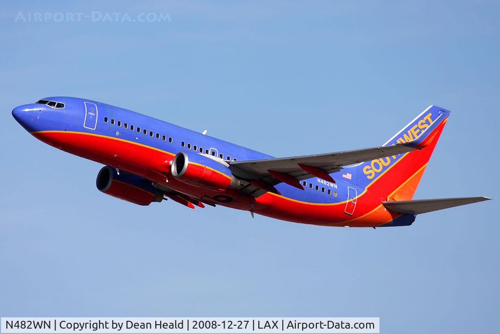 N482WN, 2004 Boeing 737-7H4 C/N 29852, Southwest Airlines N482WN (FLT SWA3219) climbing out from RWY 25R enroute to Nashville Int'l (KBNA).