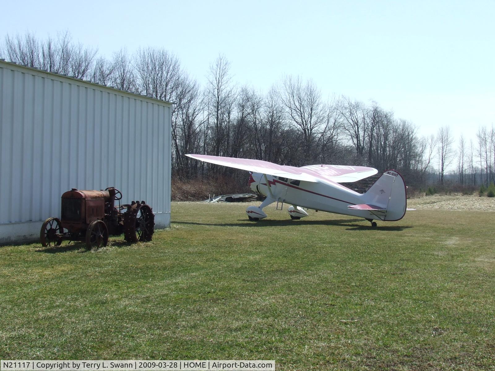 N21117, 1939 Stinson SR-9C Reliant C/N 5371, Parked at home next to the hanger
