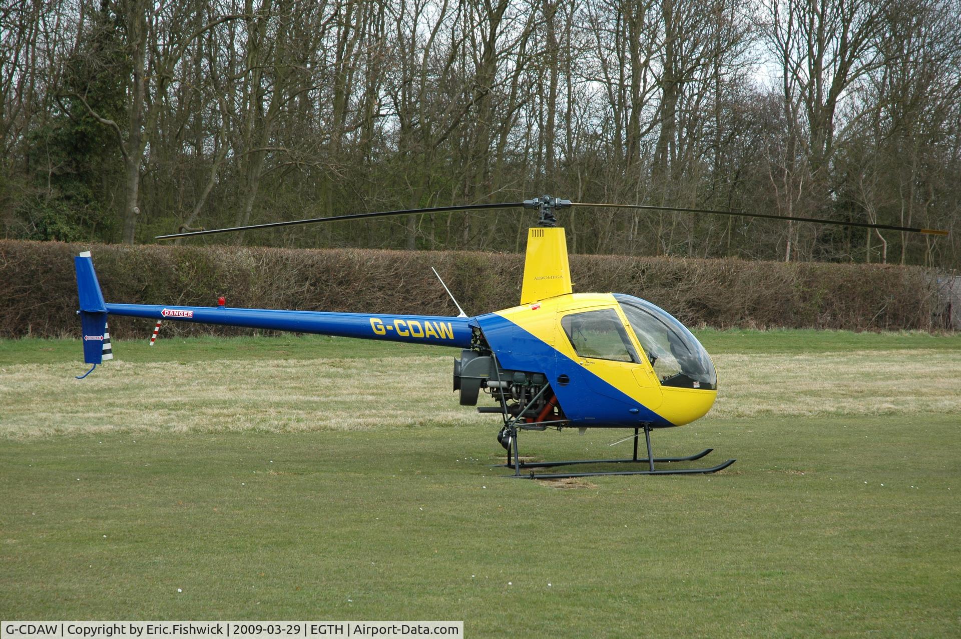 G-CDAW, 2004 Robinson R22 Beta C/N 3703, 2. G-CDAW visiting Shuttleworth (Old Warden) Aerodrome.