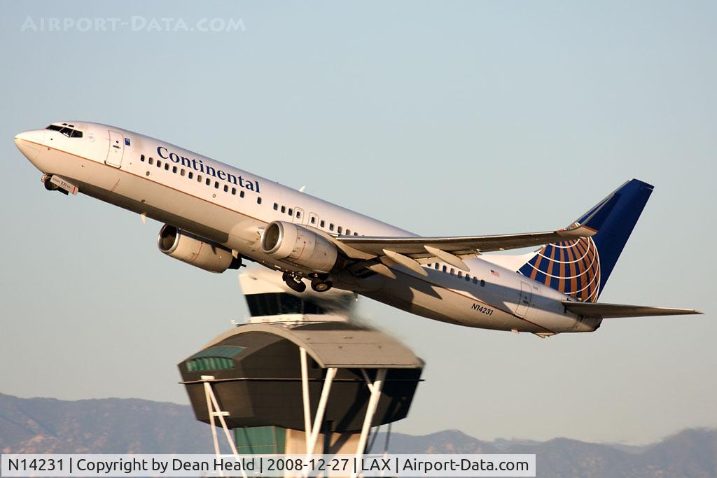 N14231, 1999 Boeing 737-824 C/N 28795, Continental Airlines N14231 (FLT COA1503) climbing out from RWY 25R enroute to Newark Liberty Int'l (KEWR).