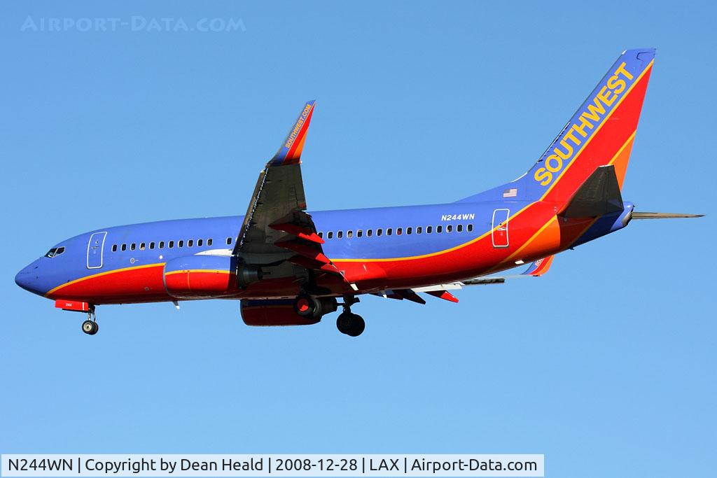 N244WN, 2006 Boeing 737-7H4 C/N 34864, Southwest Airlines N244WN (FLT SWA1669) from Tucson Int'l (KTUS) on short final to RWY 24R.