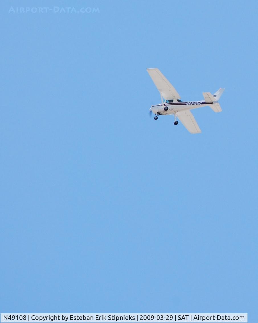 N49108, 1979 Cessna 152 C/N 15283421, southeast bound after departing SAT