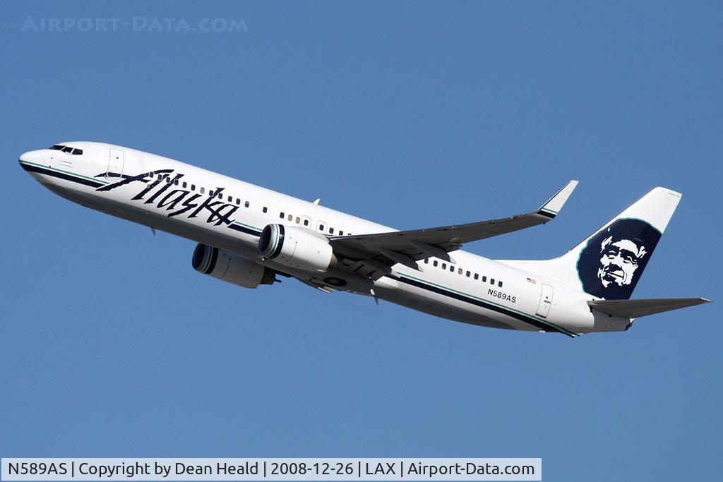 N589AS, 2007 Boeing 737-890 C/N 35686, Alaska Airlines N589AS (FLT ASA256) climbing out from RWY 25R enroute to Manzanillo Playa De Oro Int'l (MMZO).