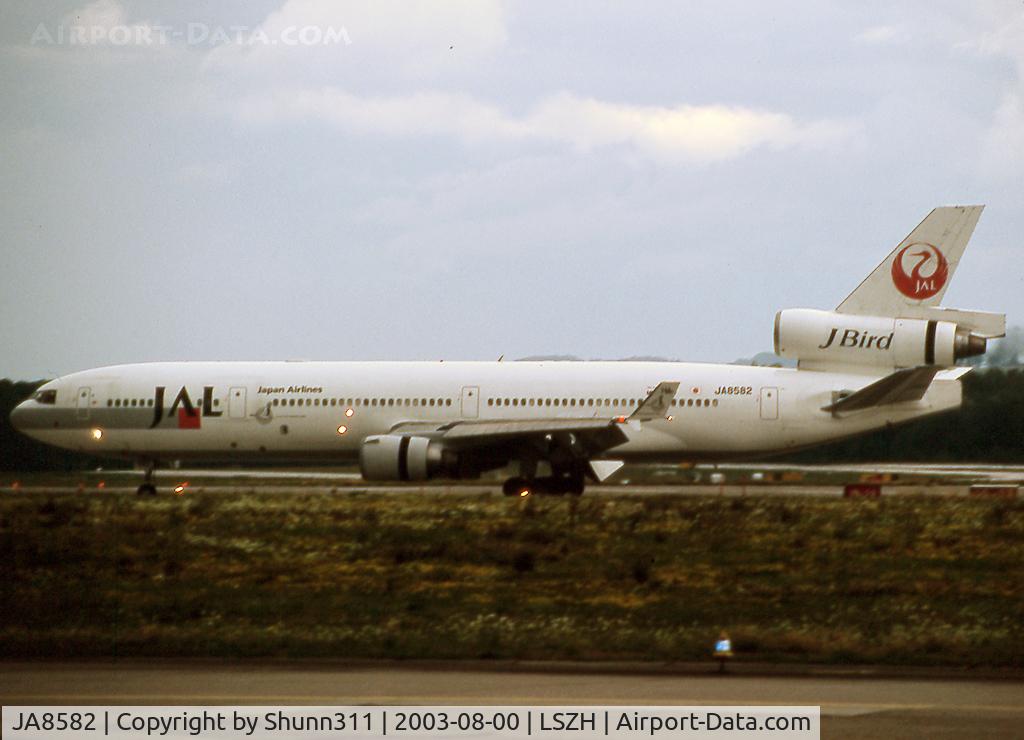 JA8582, 1994 McDonnell Douglas MD-11 C/N 48573, Taxiing holding point rwy 16 for departure