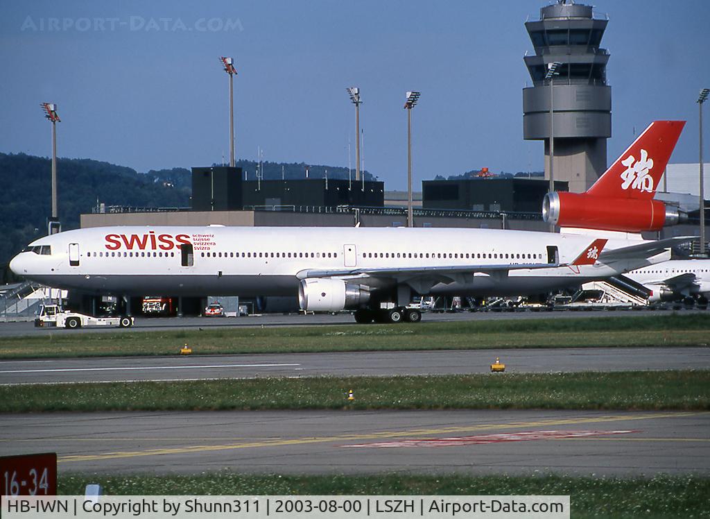 HB-IWN, 1994 McDonnell Douglas MD-11 C/N 48539, Tracted to the gate in basic Swissair Asia c/s