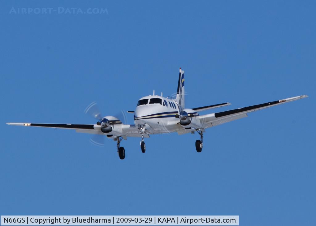 N66GS, 1967 Beech 65-A90 C/N LJ-237, Mile High Skydiving. On final approach to 17L.