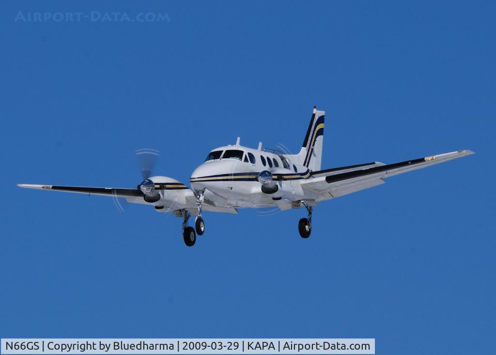 N66GS, 1967 Beech 65-A90 C/N LJ-237, Mile High Skydiving. On final approach to 17L.