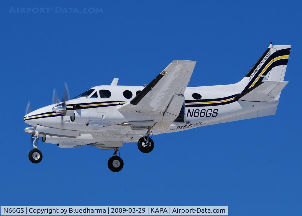 N66GS, 1967 Beech 65-A90 C/N LJ-237, Mile High Skydiving. On final approach to 17L.