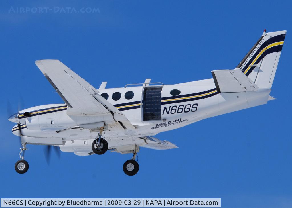 N66GS, 1967 Beech 65-A90 C/N LJ-237, Mile High Skydiving. On final approach to 17L.