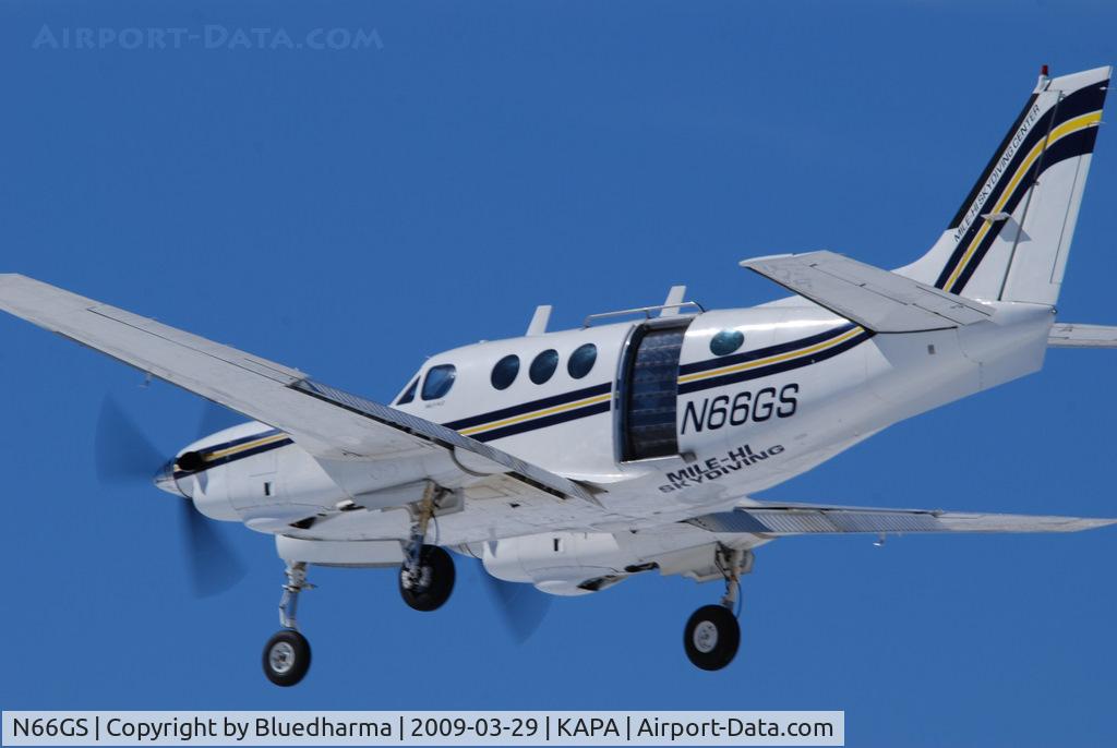 N66GS, 1967 Beech 65-A90 C/N LJ-237, Mile High Skydiving. On final approach to 17L.