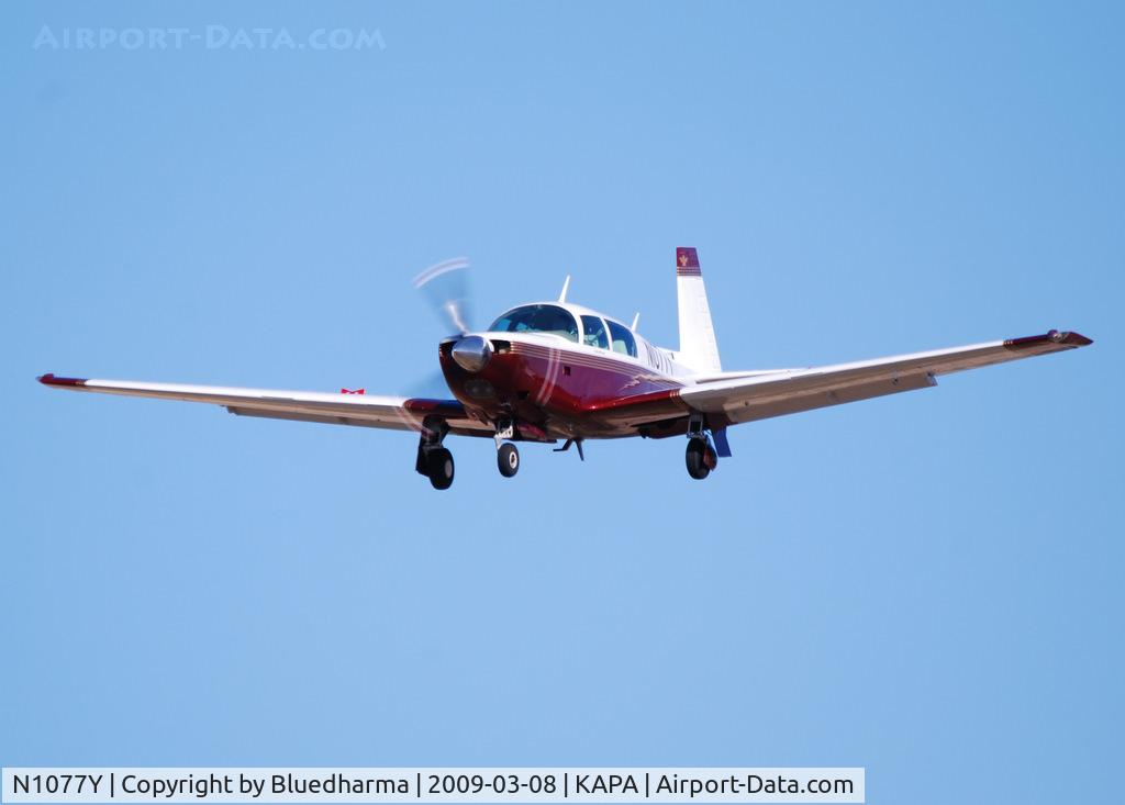 N1077Y, 1981 Mooney M20K C/N 25-0575, On final approach to 17L.
