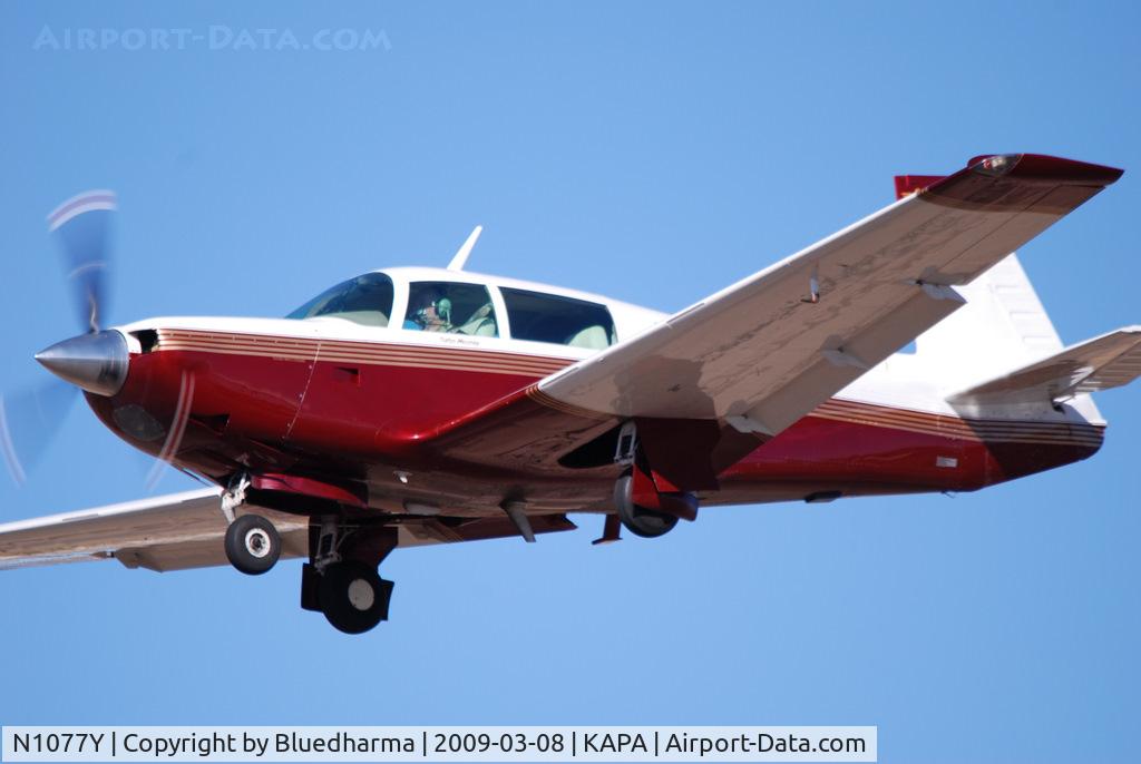 N1077Y, 1981 Mooney M20K C/N 25-0575, On final approach to 17L.