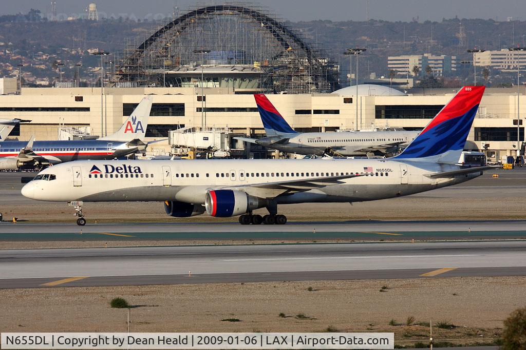 N655DL, 1990 Boeing 757-232 C/N 24395, Delta Airlines N655DL (FLT DAL607) exitting RWY 25L after arrival from John F Kennedy Int'l (KJFK).